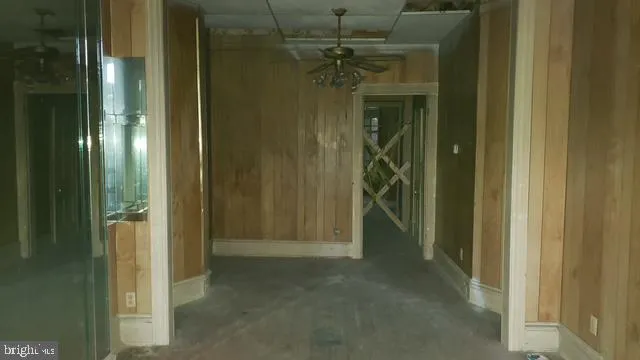 a view of a bathroom from a hallway