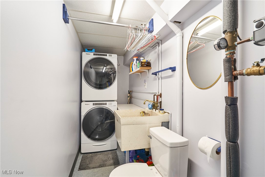 3145 Franks Road Clinton, OH 44216 - Photo 17 of 28 Laundry room in the lower level with a stationary tub, and a commode