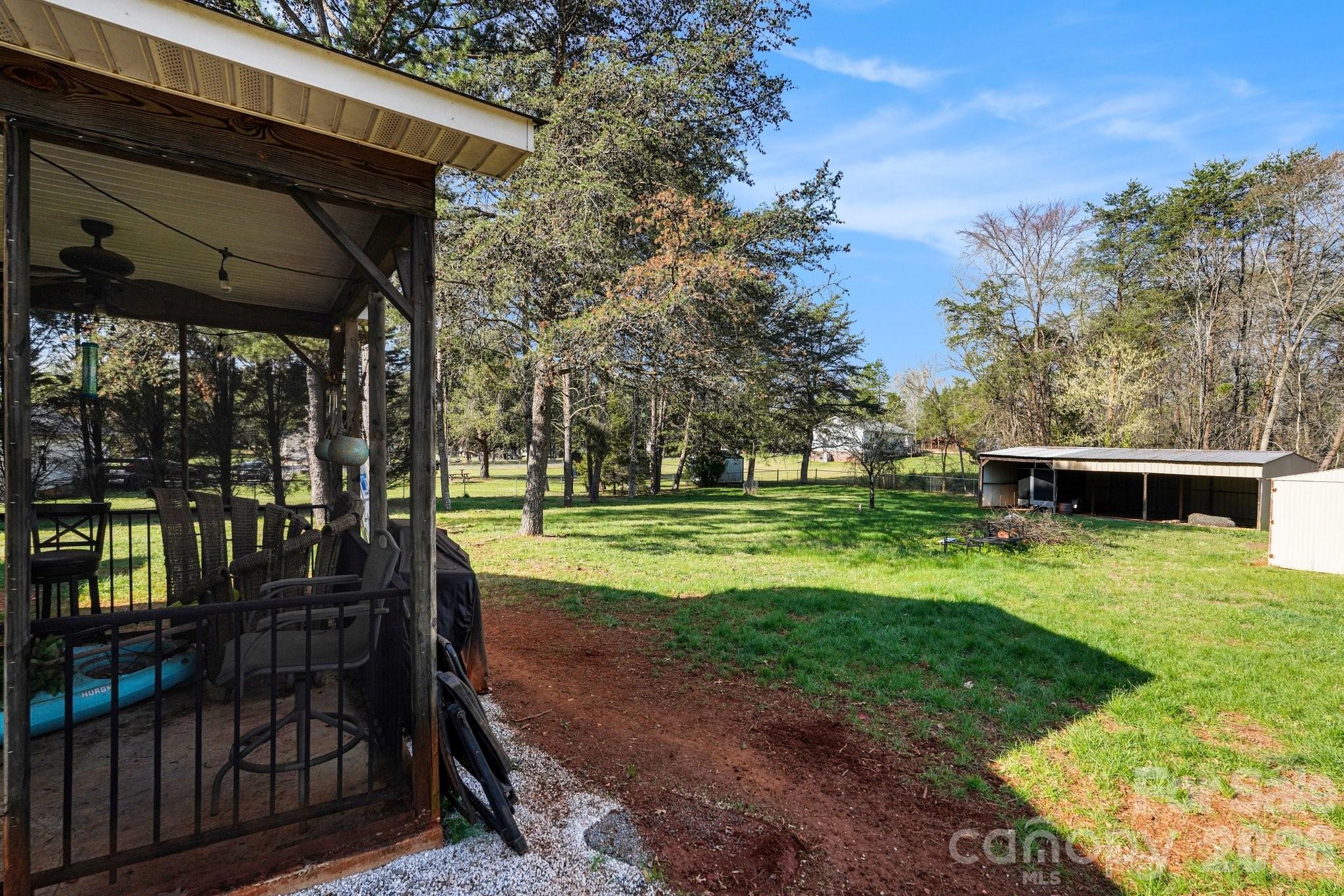 2040 Providence Church Road Salisbury, NC 28146 - Photo 13 of 14 a view of a porch with a yard