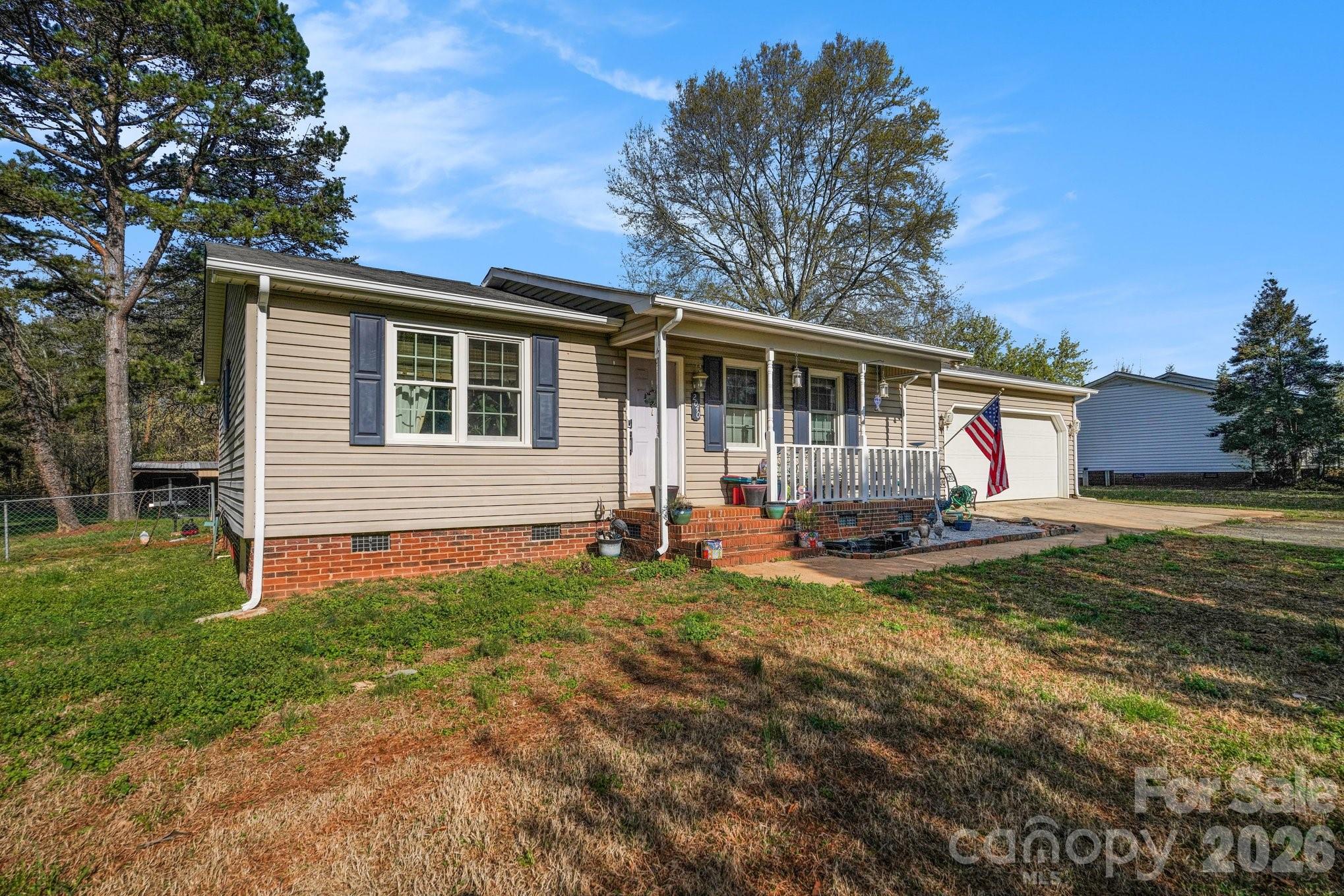 2040 Providence Church Road Salisbury, NC 28146 - Photo 14 of 14 a view of a house with backyard and sitting area