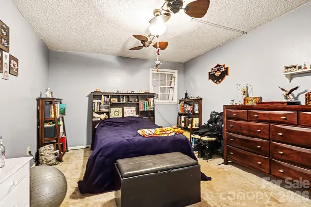 a room with furniture and chandelier