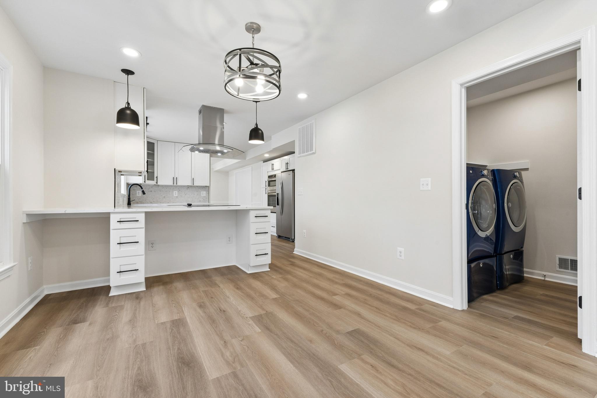 8 Lawhorn Road Stafford, VA 22554 - Photo 15 of 40 a view of a kitchen with fridge and wooden floor