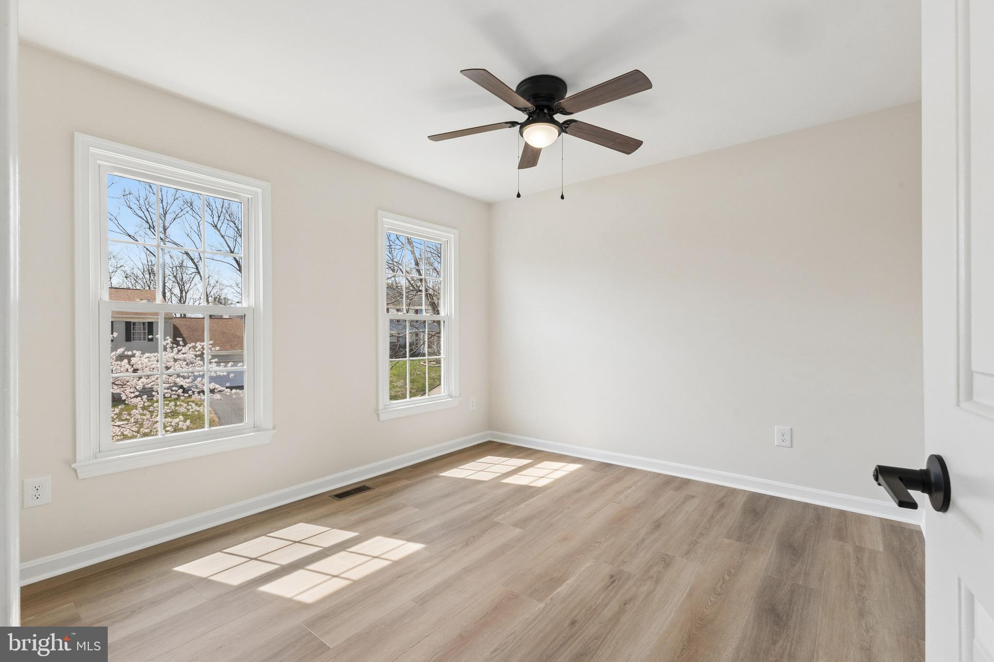 8 Lawhorn Road Stafford, VA 22554 - Photo 22 of 40 a view of empty room with wooden floor and fan