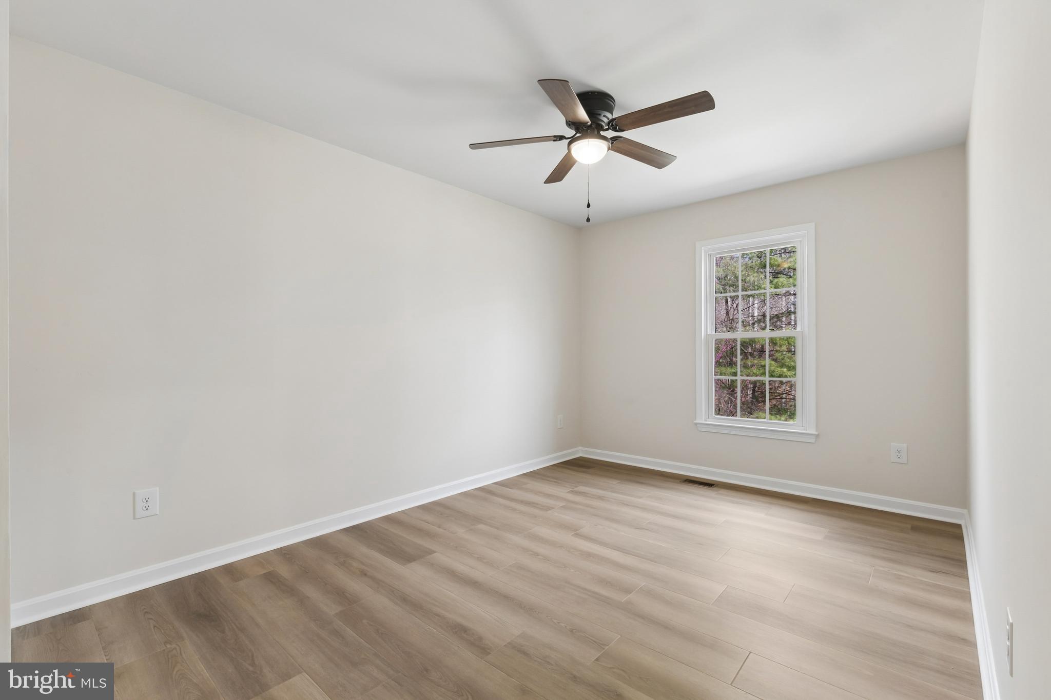 8 Lawhorn Road Stafford, VA 22554 - Photo 24 of 40 wooden floor in an empty room with a window
