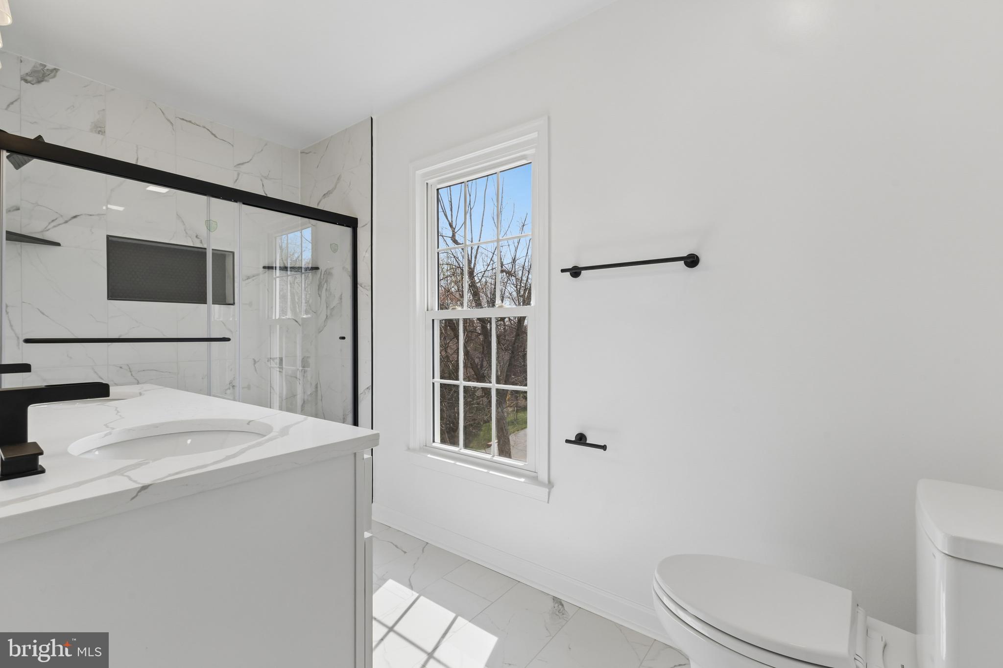 8 Lawhorn Road Stafford, VA 22554 - Photo 26 of 40 a bathroom with a sink toilet and shower