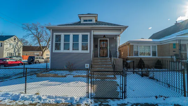 a front view of a house with a porch