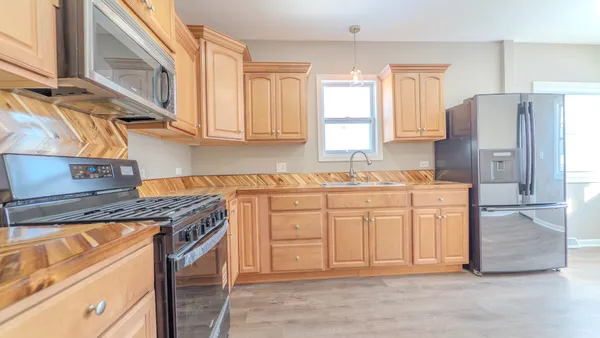 $299,000 | 9801 South Exchange Avenue, Chicago, IL 60617