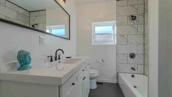 $299,000 | 9801 South Exchange Avenue, Chicago, IL 60617