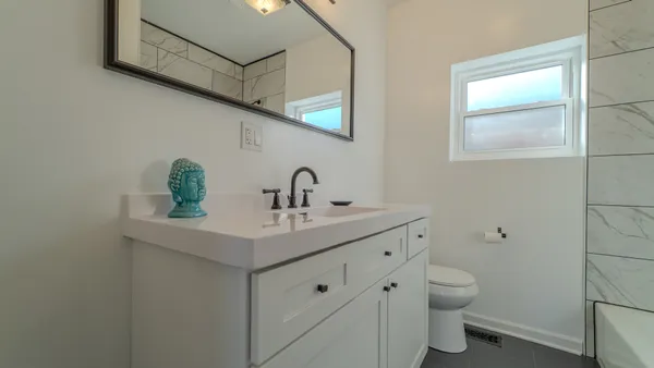 $299,000 | 9801 South Exchange Avenue, Chicago, IL 60617