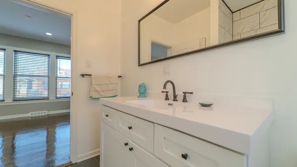 $299,000 | 9801 South Exchange Avenue, Chicago, IL 60617