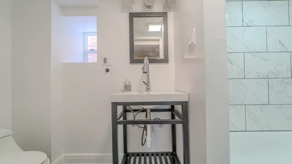 $299,000 | 9801 South Exchange Avenue, Chicago, IL 60617