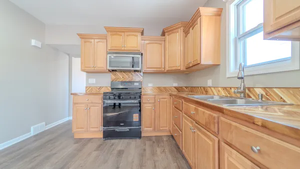 $299,000 | 9801 South Exchange Avenue, Chicago, IL 60617