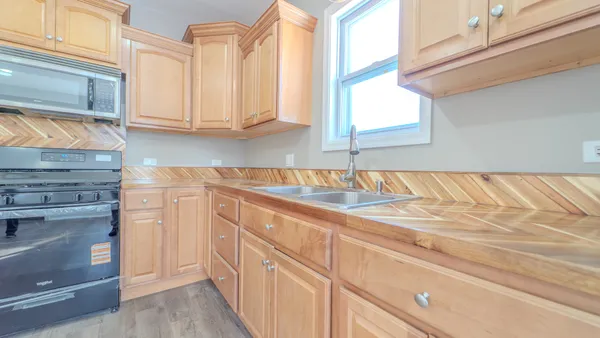 $299,000 | 9801 South Exchange Avenue, Chicago, IL 60617