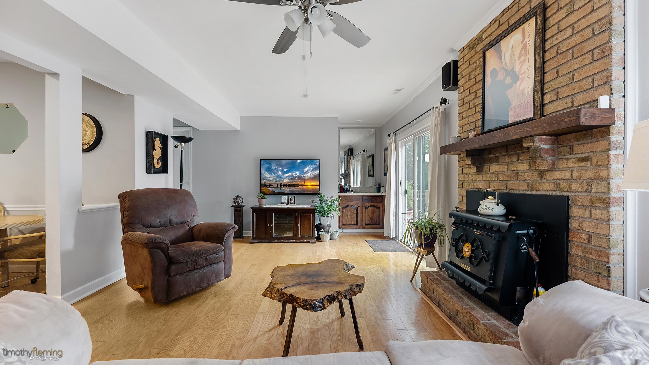 3 Inlet Ocean View, NJ 08230 - Photo 14 of 42 a living room with furniture and a fireplace