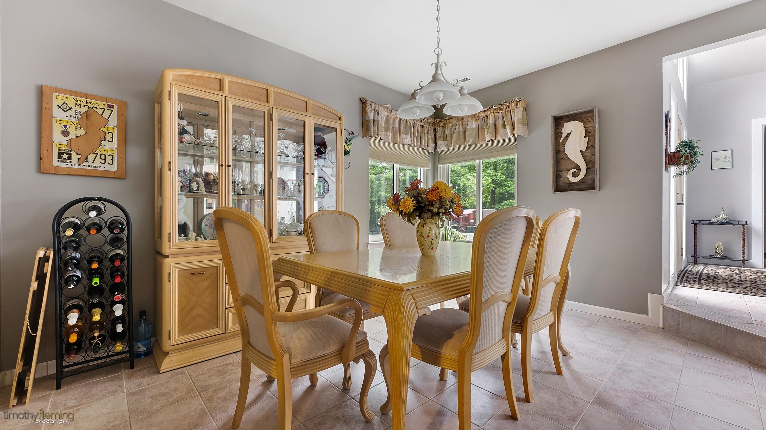 3 Inlet Ocean View, NJ 08230 - Photo 9 of 42 a view of a dining room with furniture and chandelier