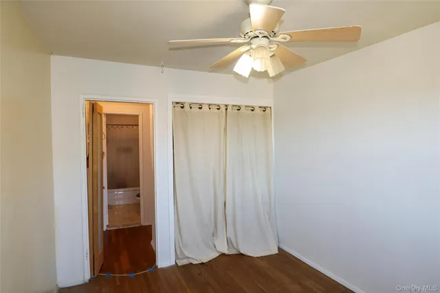 a view of a livingroom with wooden floor