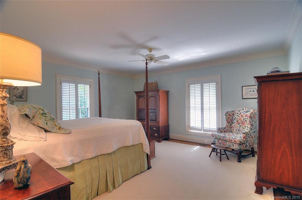 1518 Andover Road Charlotte, NC 28211 - Photo 15 of 22 a bedroom with a bed couch and window