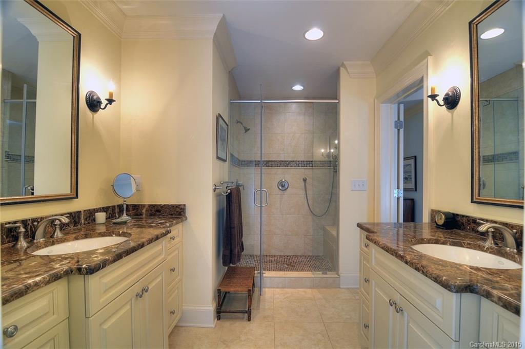 1518 Andover Road Charlotte, NC 28211 - Photo 17 of 22 a bathroom with a granite countertop sink and a mirror