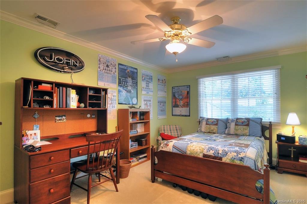 1518 Andover Road Charlotte, NC 28211 - Photo 18 of 22 a bedroom with a bed and furniture