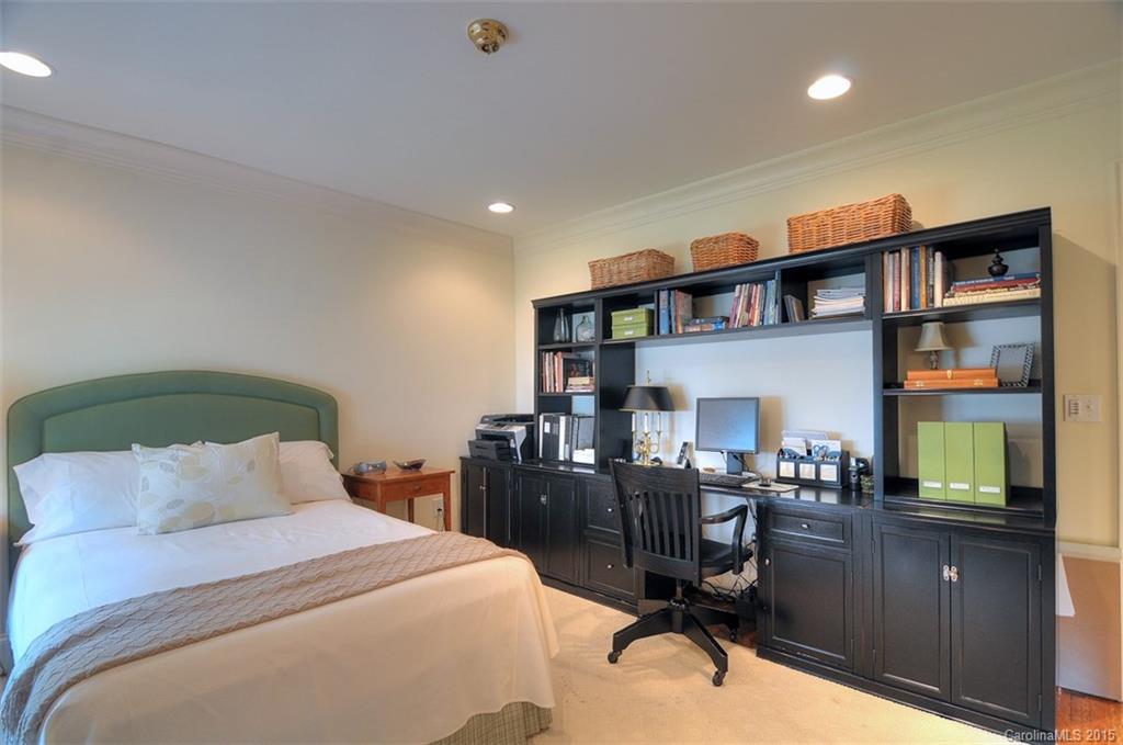 1518 Andover Road Charlotte, NC 28211 - Photo 19 of 22 a bedroom with a bed and furniture