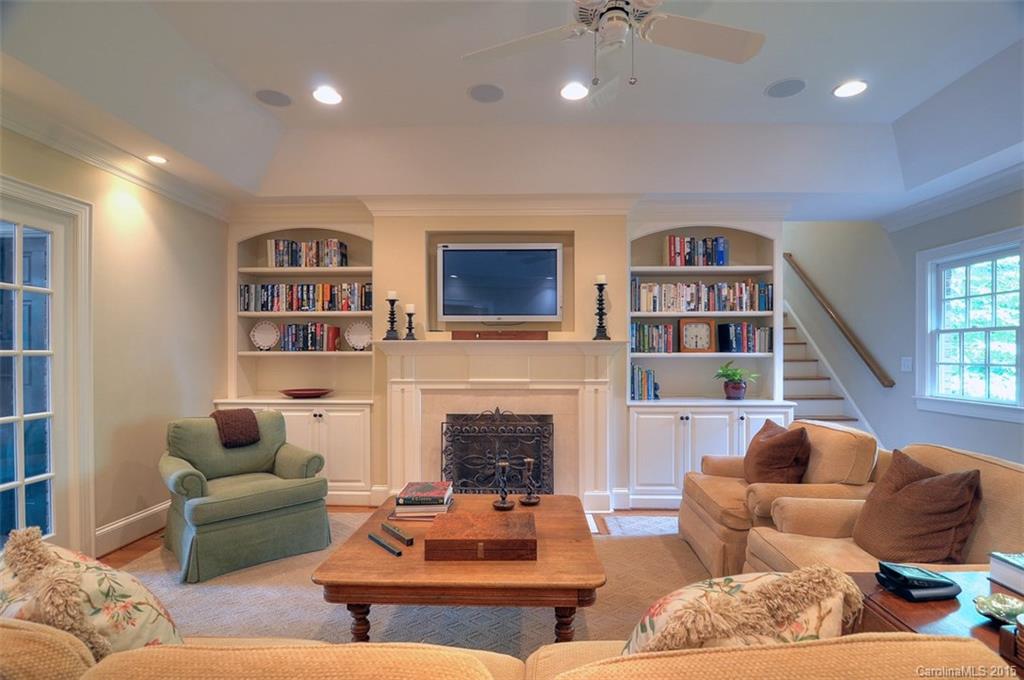 1518 Andover Road Charlotte, NC 28211 - Photo 4 of 22 a living room with furniture and a fireplace