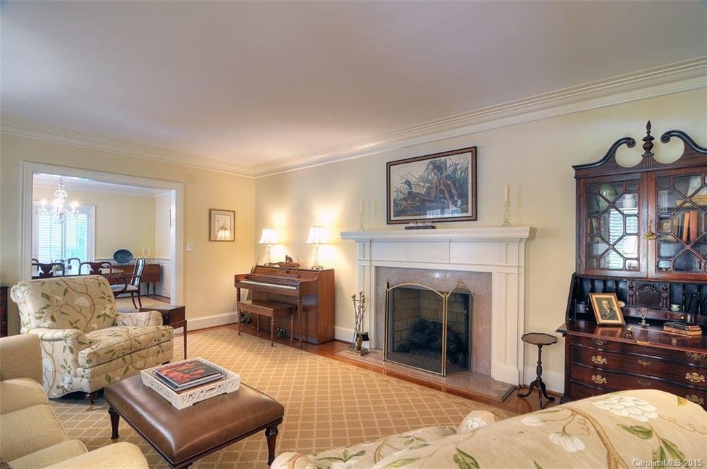 1518 Andover Road Charlotte, NC 28211 - Photo 6 of 22 a living room with furniture and a fireplace