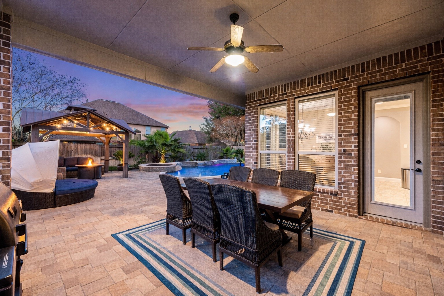 9518 Three Stone Lane Tomball, TX 77375 - Photo 32 of 33 A spacious outdoor covered patio, an ample space for entertaining!