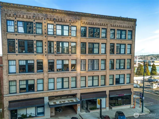 a front view of a building with glass windows