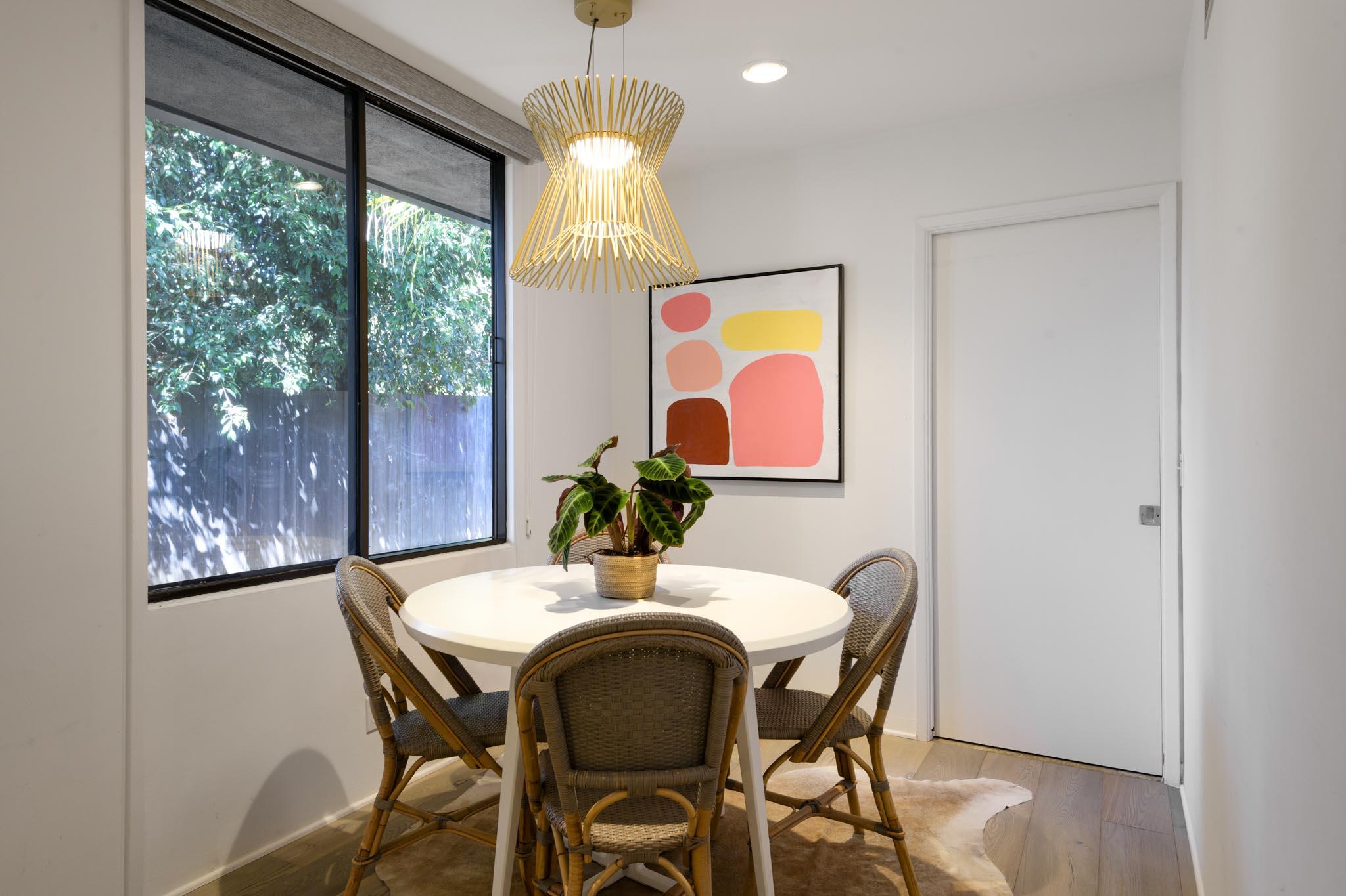 1695 Fernald Point Lane Montecito, CA 93108 - Photo 15 of 38 a dining room with furniture a chandelier and window