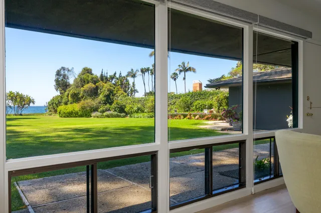 a view of a porch and a yard