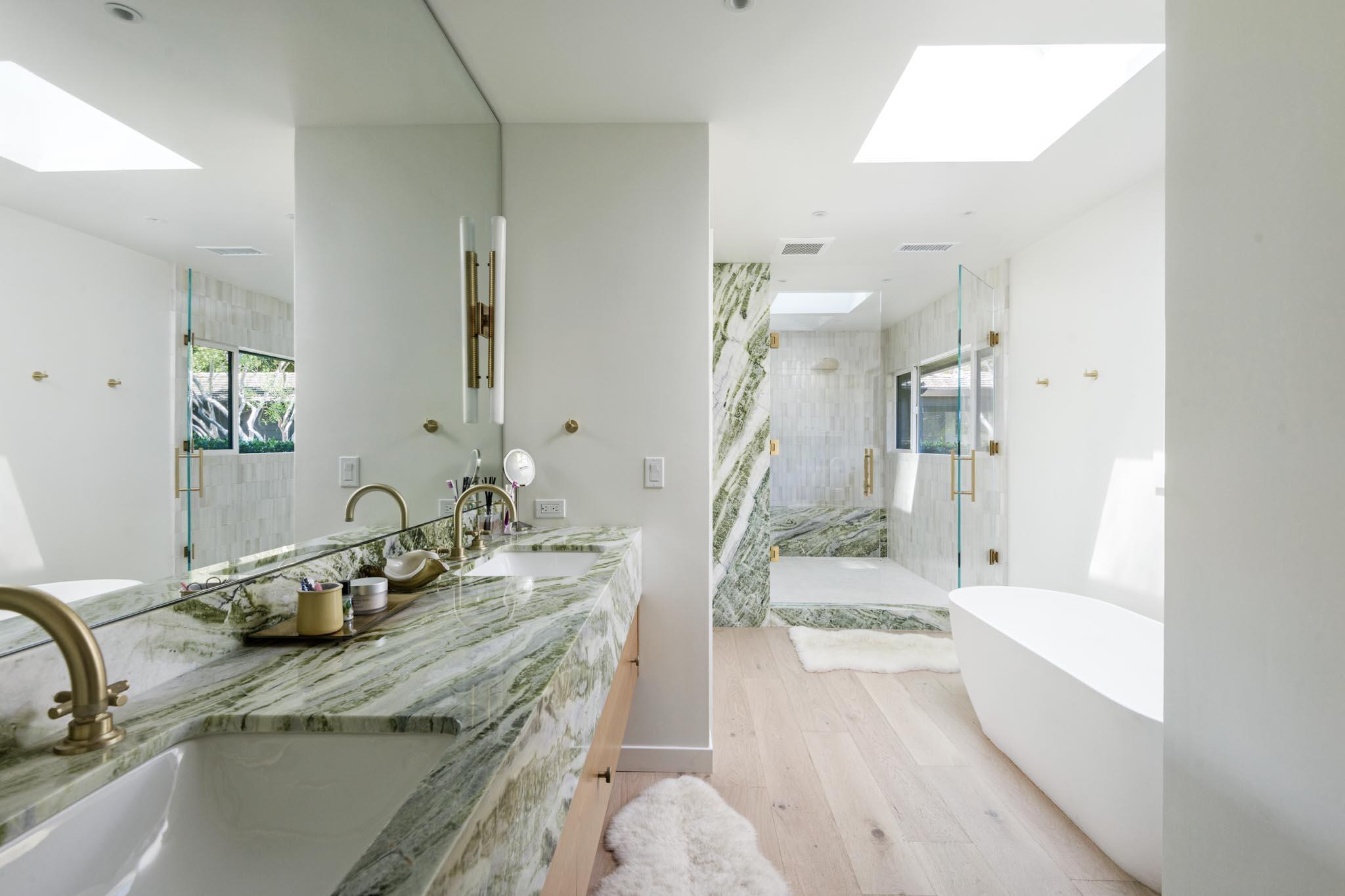 1695 Fernald Point Lane Montecito, CA 93108 - Photo 26 of 38 a bathroom with a granite countertop sink and a mirror
