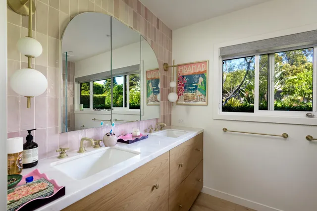 a living room with a couch and a dining table