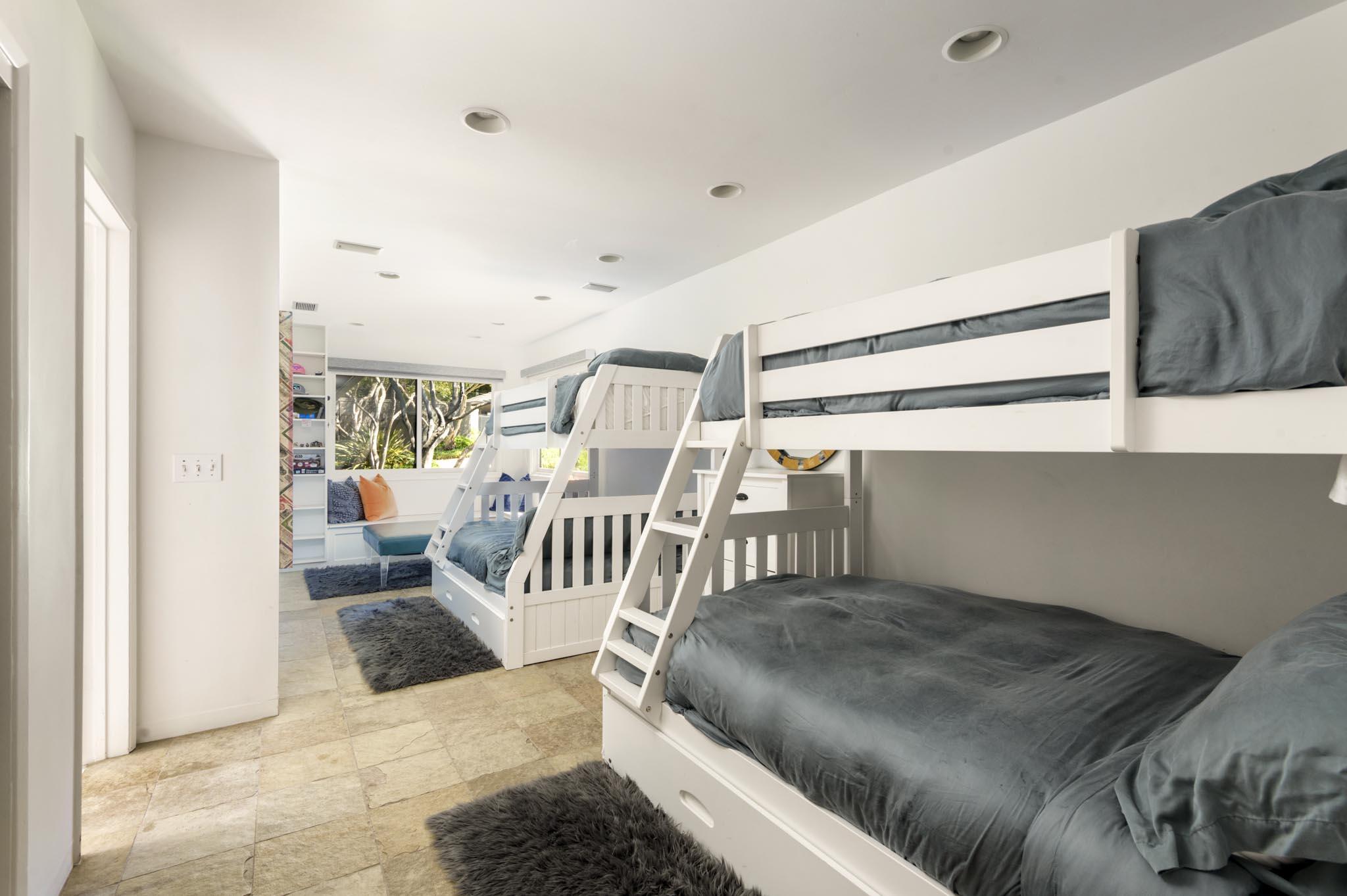 1695 Fernald Point Lane Montecito, CA 93108 - Photo 33 of 38 a living room with a couch and a dining table