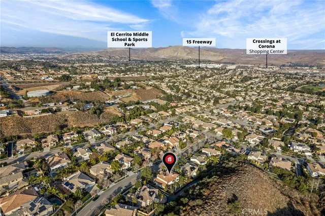 a view of a street with a building in the background