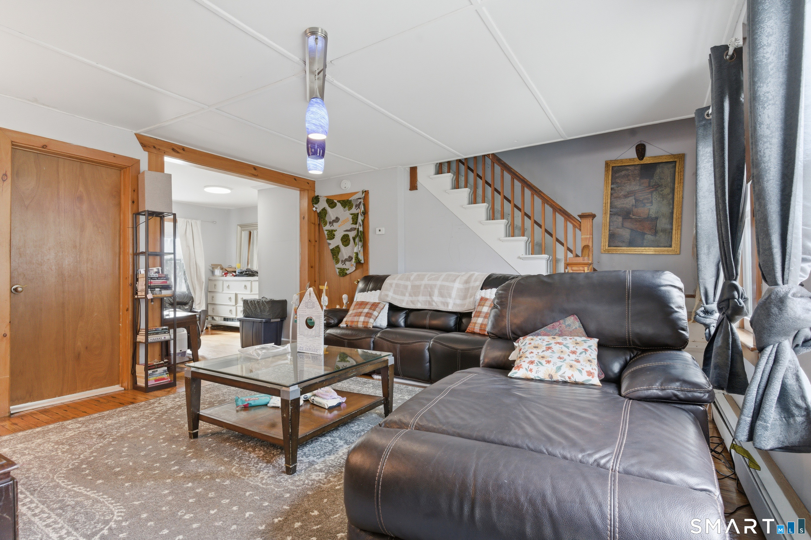 36 Church Street Killingly, CT 06241 - Photo 4 of 39 a living room with furniture and wooden floor