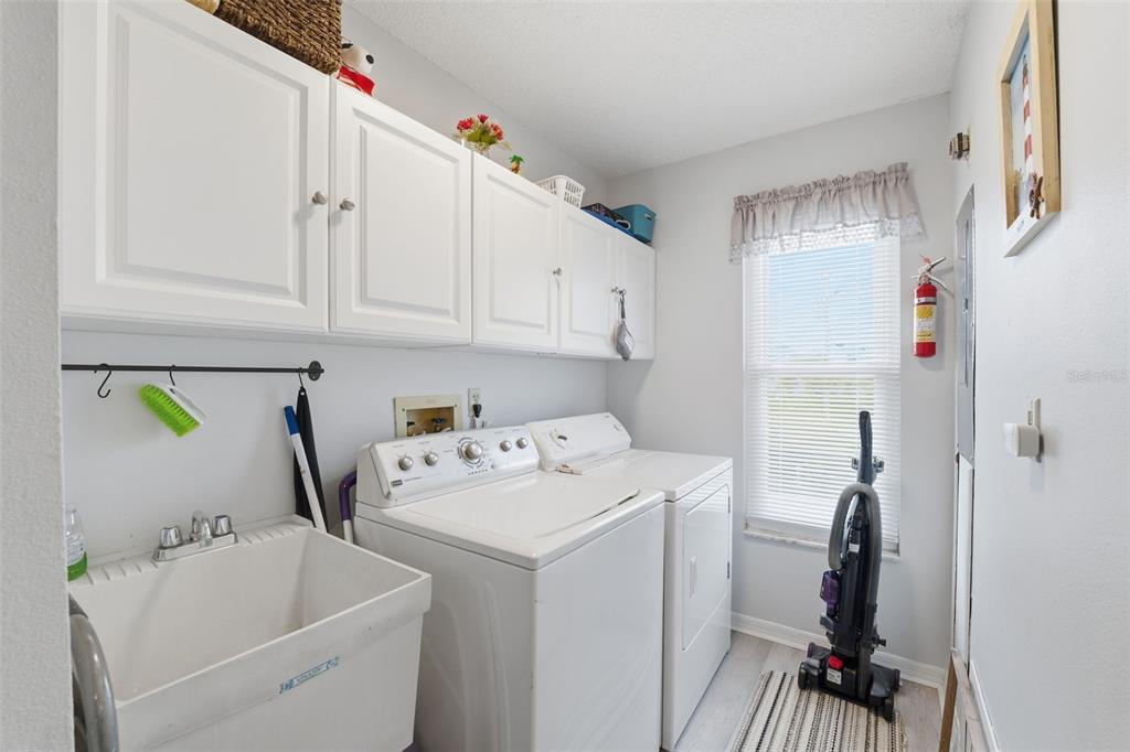 3366 Bluefish Drive Hernando Beach, FL 34607 - Photo 19 of 75 a utility room with dryer and washer
