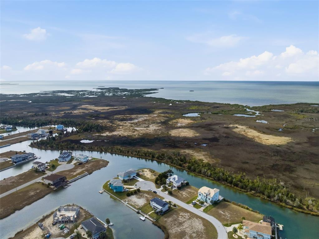 3366 Bluefish Drive Hernando Beach, FL 34607 - Photo 48 of 75 an aerial view of a city