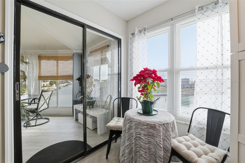 3366 Bluefish Drive Hernando Beach, FL 34607 - Photo 58 of 75 a dining room with furniture and flowers