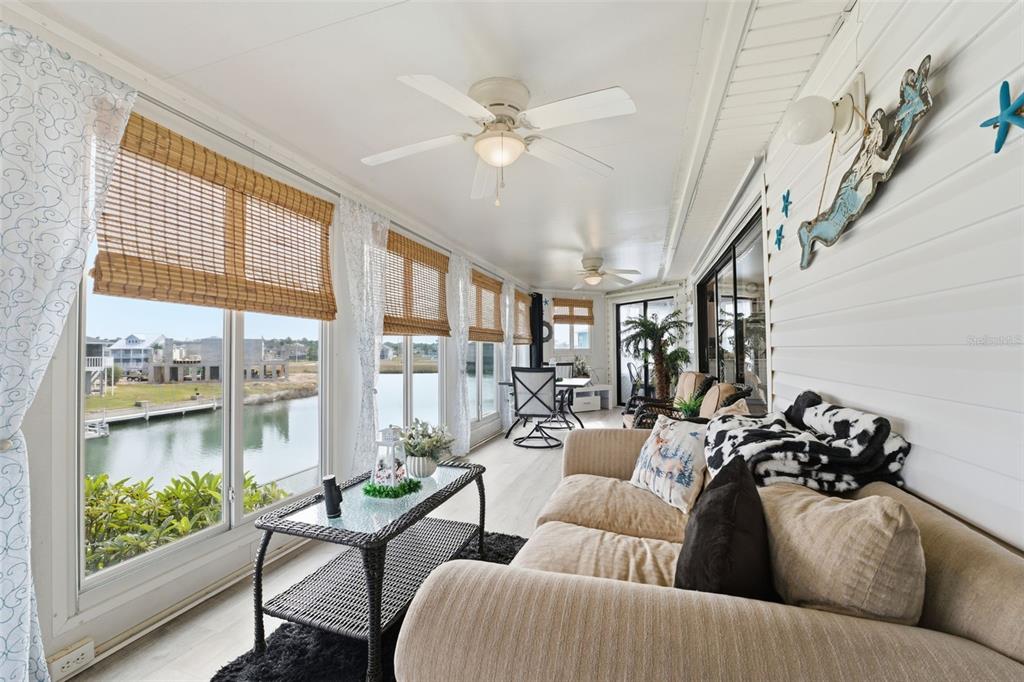 3366 Bluefish Drive Hernando Beach, FL 34607 - Photo 71 of 75 a living room with furniture and a large window