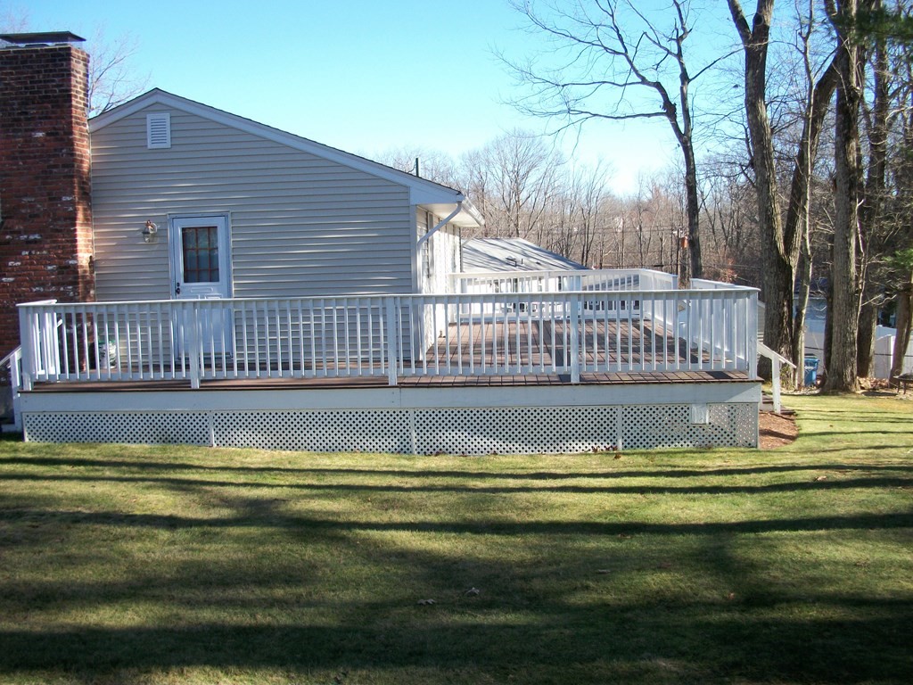 3 Juniper Lane Rutland, MA 01543 - Photo 4 of 17 a view of swimming pool with a garden