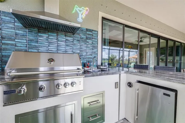 a stove top oven sitting inside of a kitchen