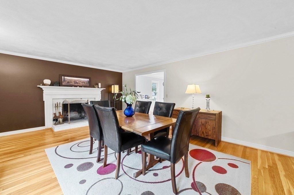 21 Olde Lantern Road Acton, MA 01720 - Photo 8 of 41 a view of a dining room with furniture