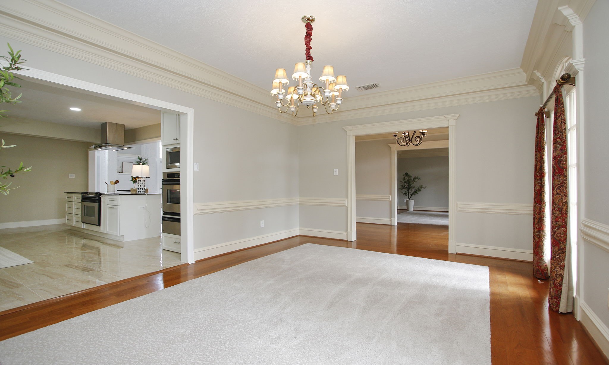 16114 Kempton Park Drive Spring, TX 77379 - Photo 15 of 46 FORMAL DINING ROOM ADJACENT TO KITCHEN - Entertain in this elegant dining room with the kitchen to the left.