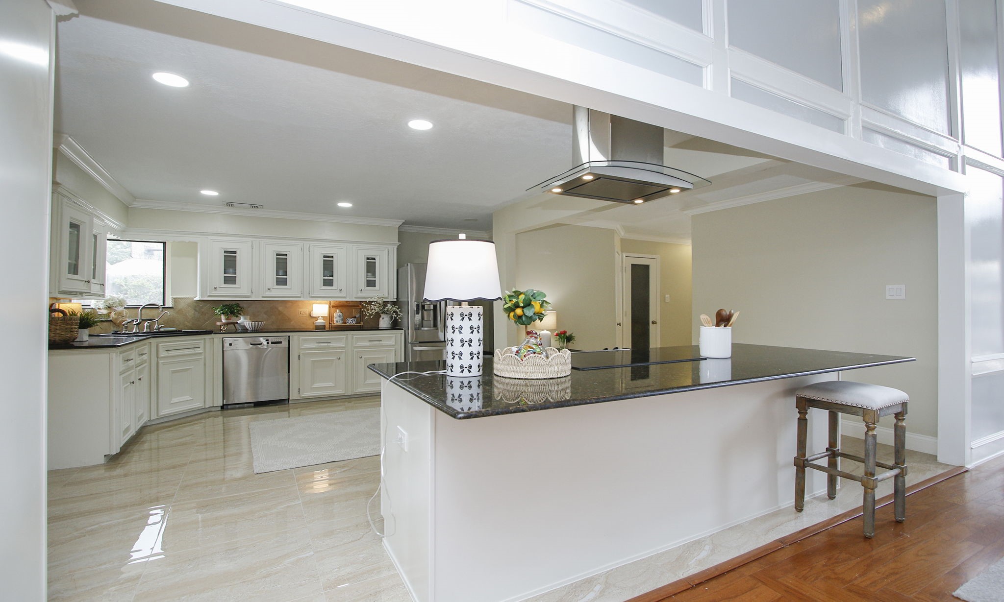 16114 Kempton Park Drive Spring, TX 77379 - Photo 17 of 46 KITCHEN IS OPEN TO THE DEN - This kitchen is perfect for entertaining with the large granite island with electric range.