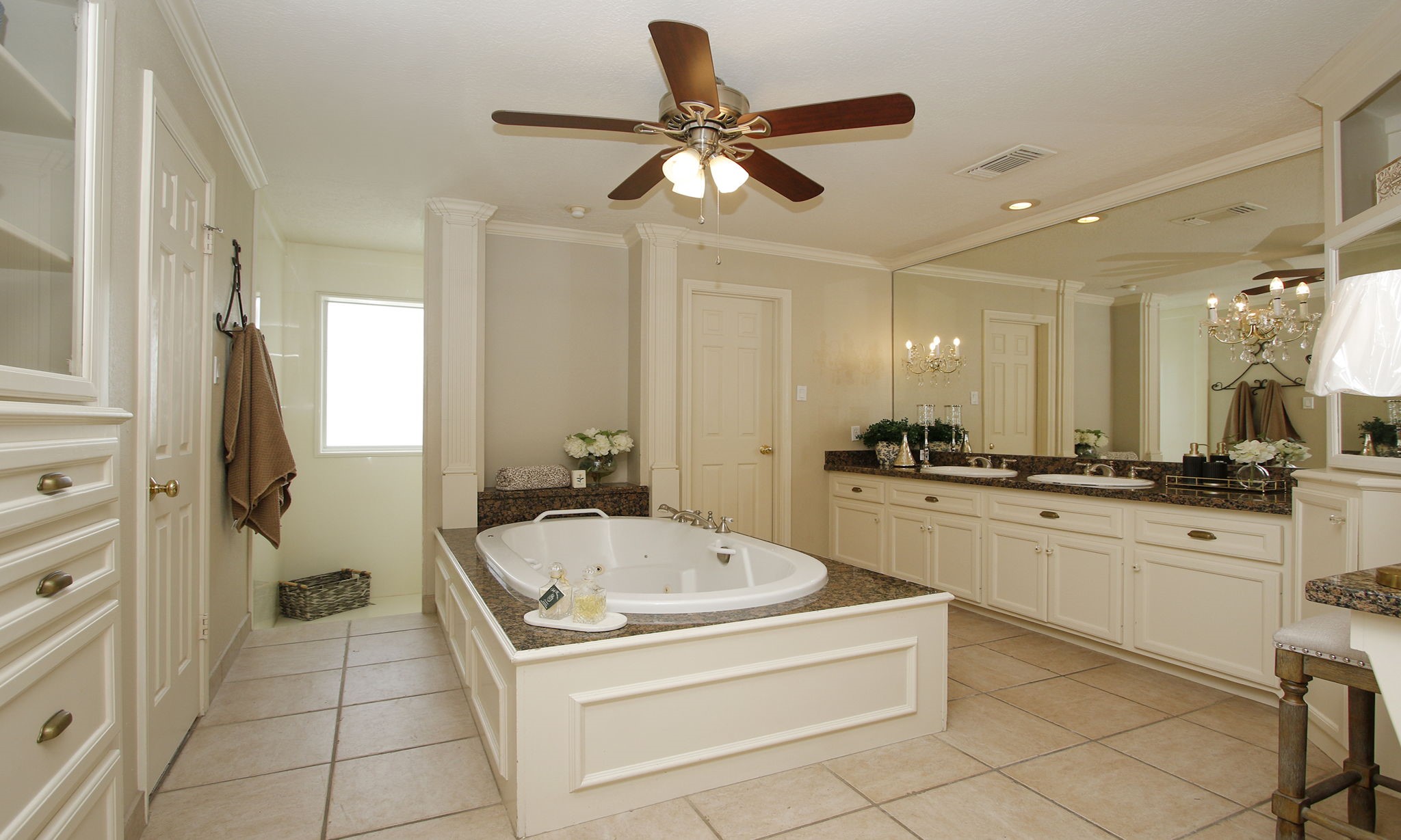 16114 Kempton Park Drive Spring, TX 77379 - Photo 24 of 46 PRIMARY BATHROOM - This beautiful bathroom has a jetted tub, separate walk in shower and crystal sconces.