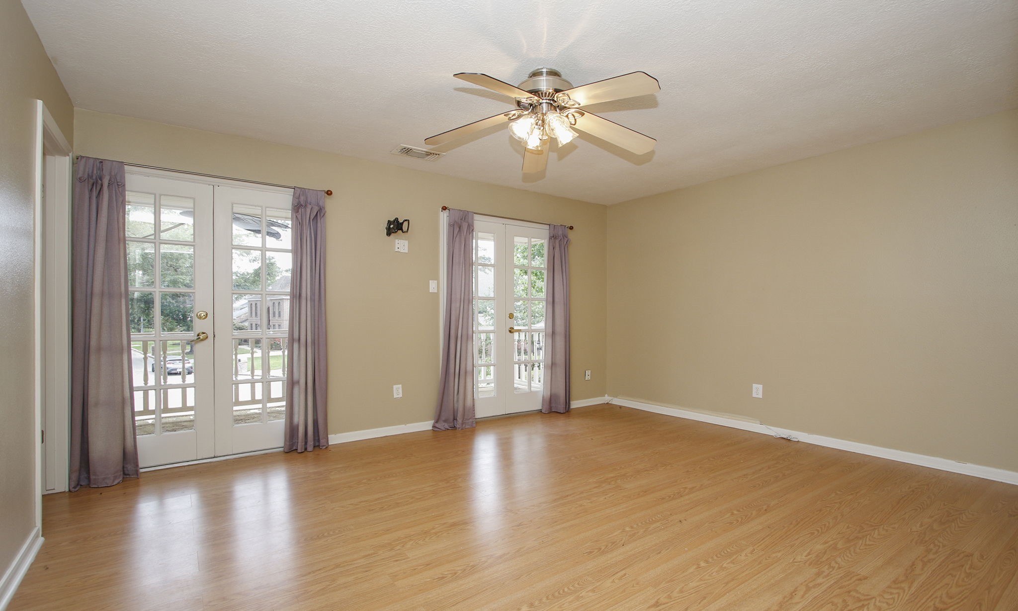 16114 Kempton Park Drive Spring, TX 77379 - Photo 28 of 46 SECOND FLOOR BEDROOM - This bedroom is located on the second floor on the left front of the home has has an Ensuite bathroom. Doors in this bedroom lead to the balcony.