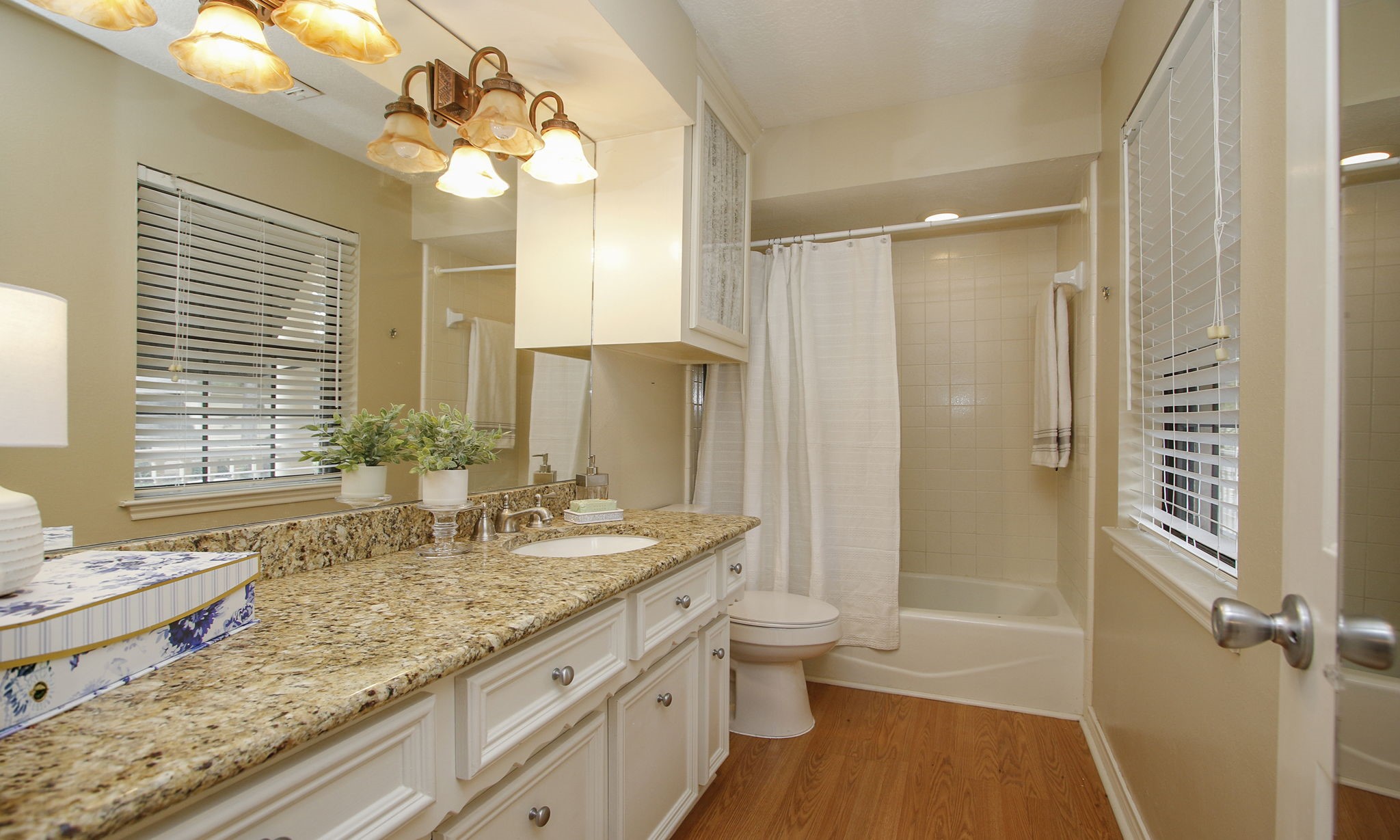 16114 Kempton Park Drive Spring, TX 77379 - Photo 29 of 46 ENSUITE BATHROOM - This remodeled bathroom has granite vanity and vinyl floors.