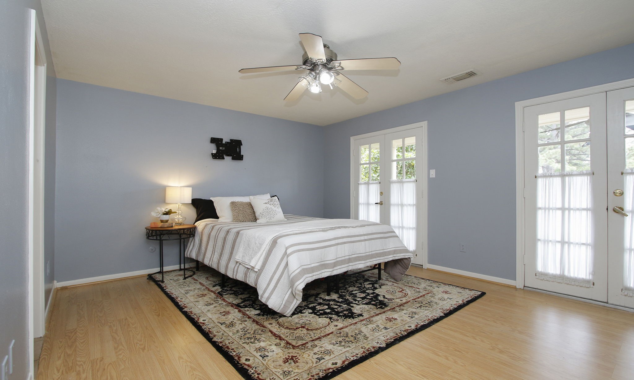 16114 Kempton Park Drive Spring, TX 77379 - Photo 30 of 46 SECOND FLOOR BEDROOM - This bedroom is located at the top of the stairs, adjacent to a bathroom. The doors lead to the balcony.