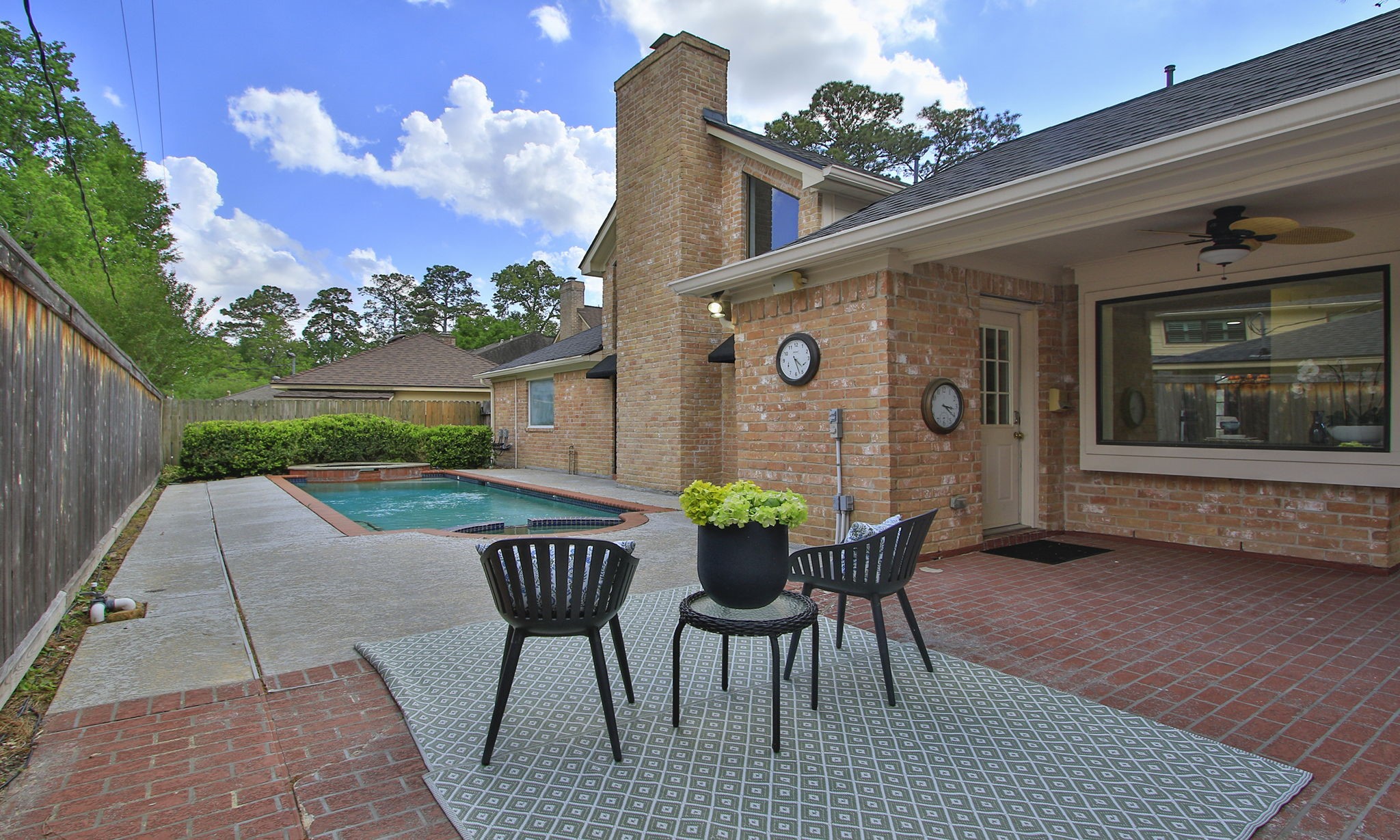 16114 Kempton Park Drive Spring, TX 77379 - Photo 41 of 46 PATIO OUTSIDE BACK DOOR - This patio connects the house to the garage with plenty of room for relaxing by the pool.