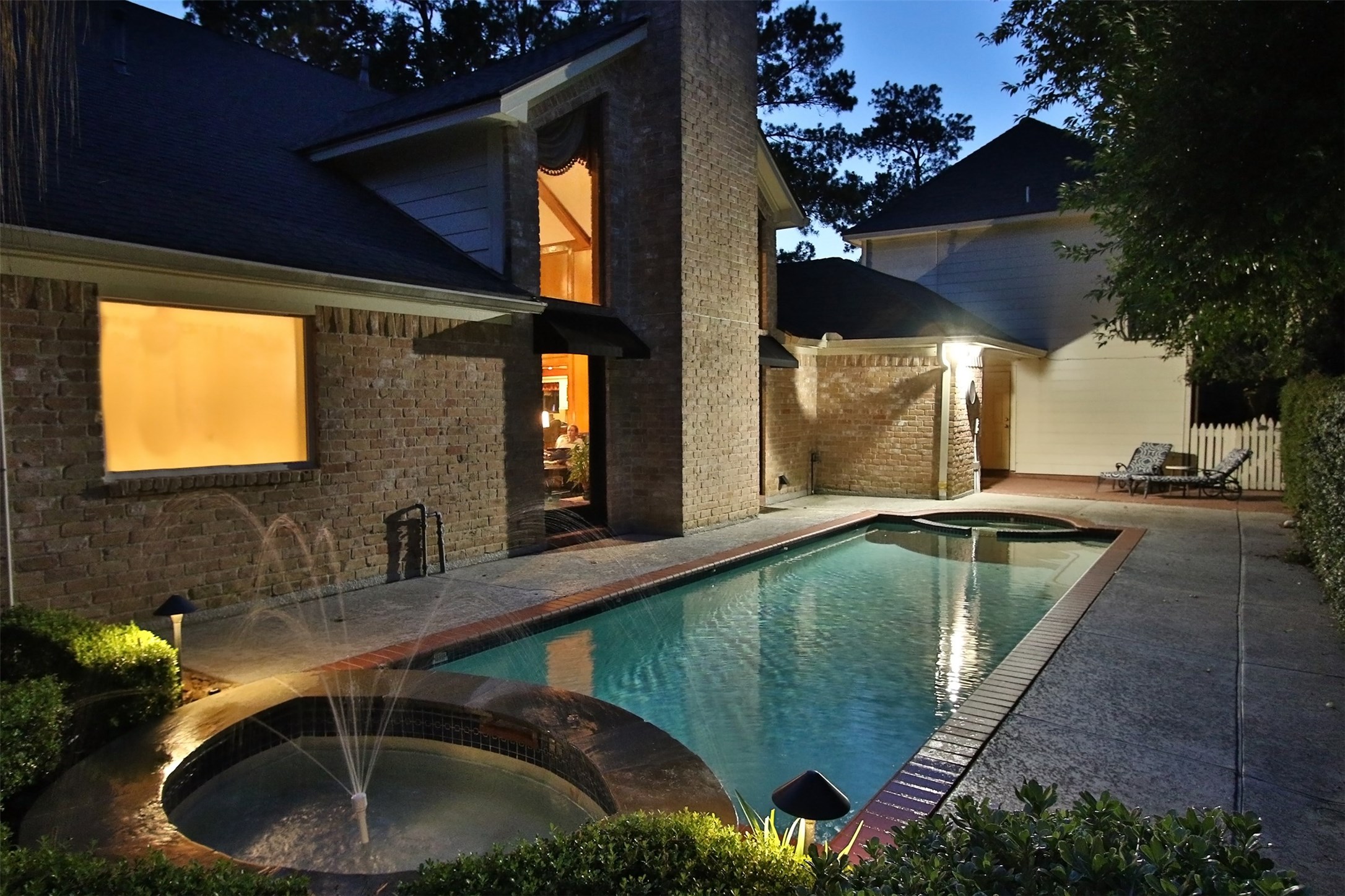 16114 Kempton Park Drive Spring, TX 77379 - Photo 46 of 46 PRIVACY AND GENTLE BREEZES OFFER A
RELAXING EVENING - This close up shows the
second water spray at the end of the pool. The pool
is great for exercising as it is designed as a lap
pool as well as a recreational pool.